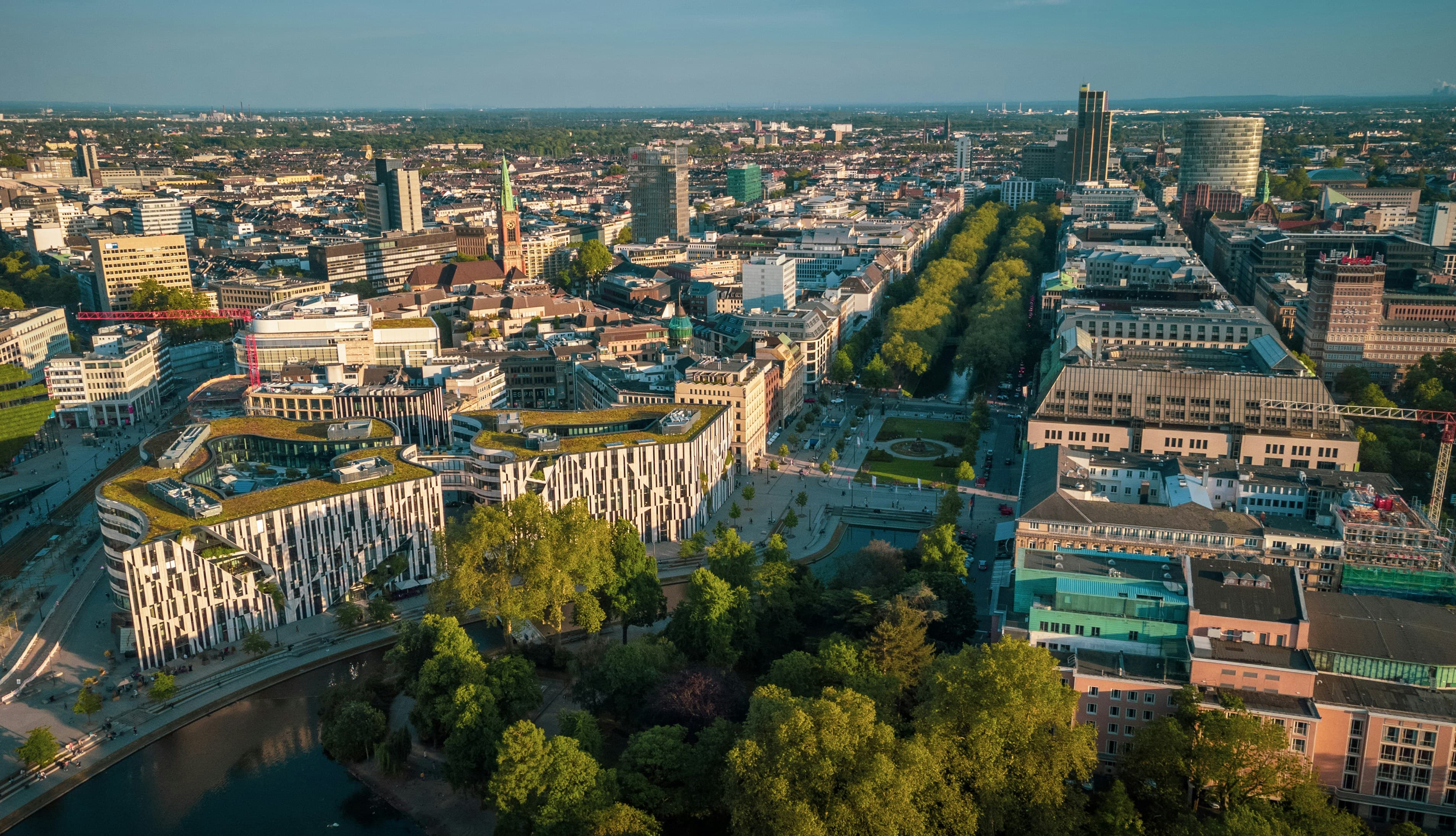 German city skyline representing international pathways through Western Bridge