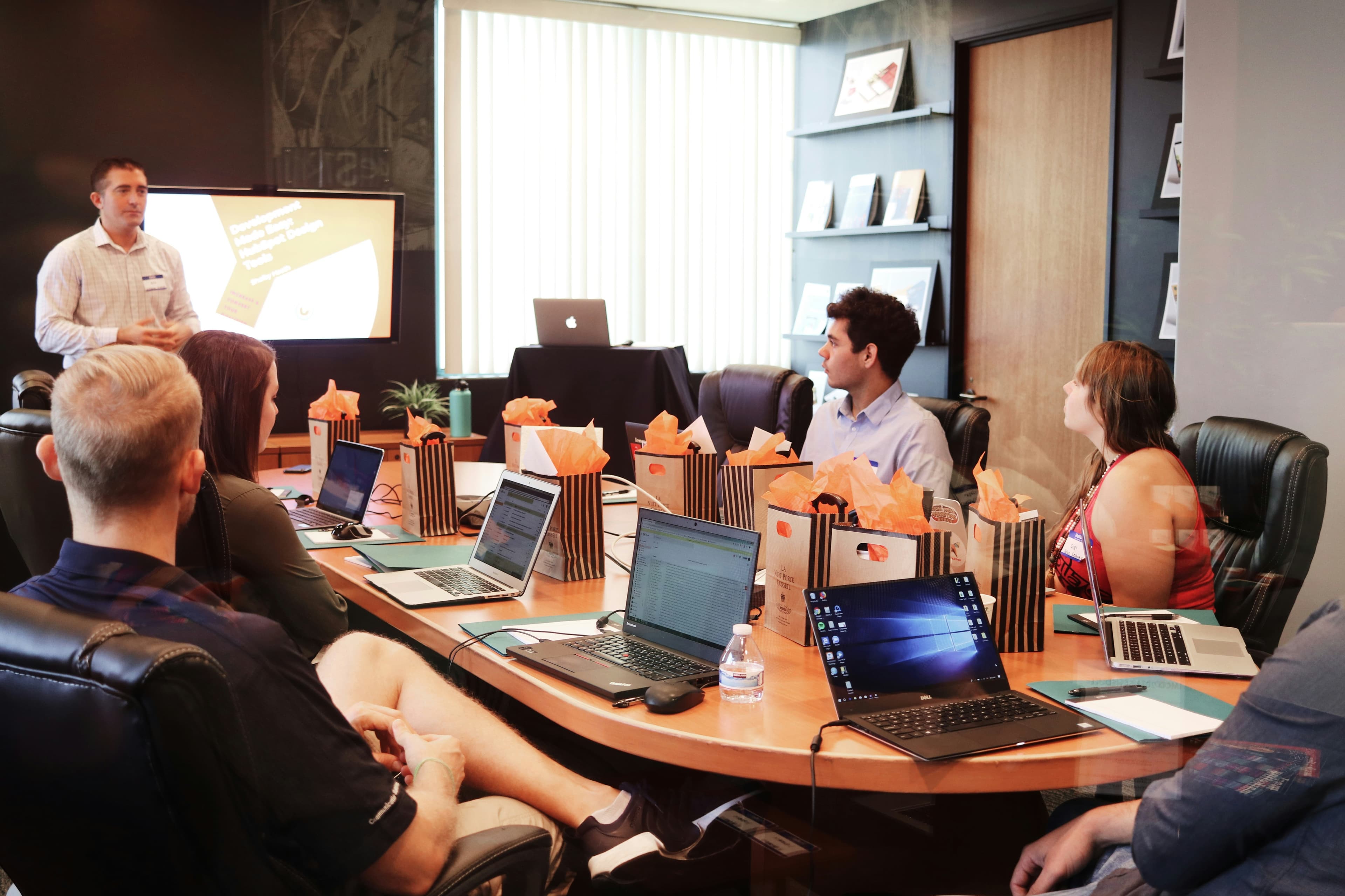 International consulting team reviewing strategy and client requirements